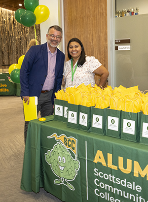SCC President greets alumni.