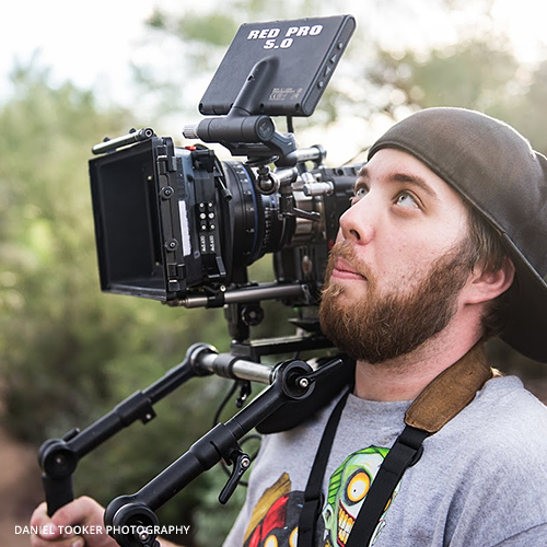 camera person looking up a camera screen