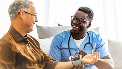 nurse assisting patient