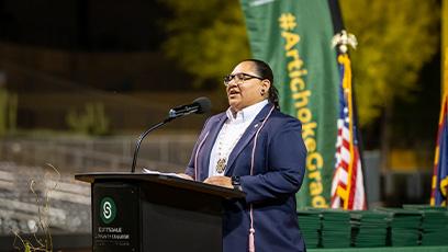 Mikah Carlos speaking at Scottsdale Community College's 2024 Commencement ceremony