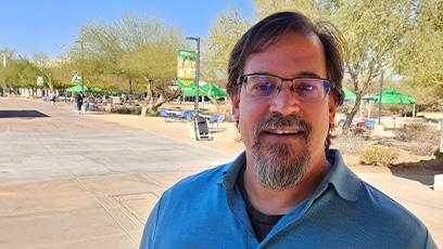 Robert Martin, SCC 2025 Educator of the Year standing on SCC campus