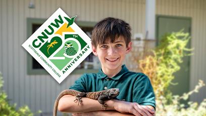 adolescent holding reptile with CNUW 25th Anniversary logo in background