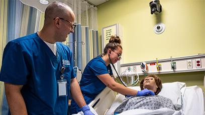 nursing students administering to patient