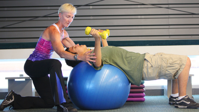 personal trainer with student