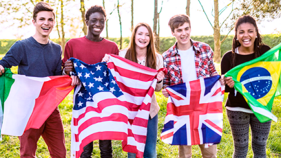 students holding flags from different countries