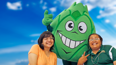 artichoke mascot and two students