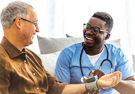 nurse assisting patient