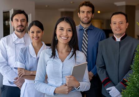 group of five hospitality employees