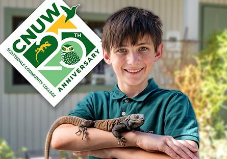 child holding reptile CNUW 25th Anniversary