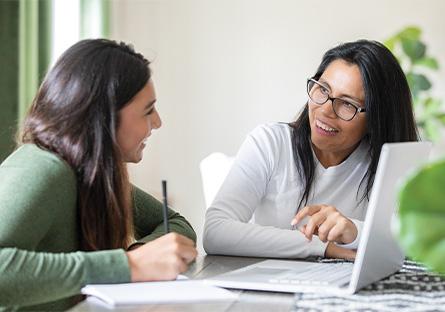 Two women discussing about career services