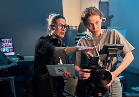 instructor direction camera person on a shoot