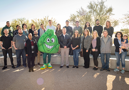 Scholarship recipients pose with mascot