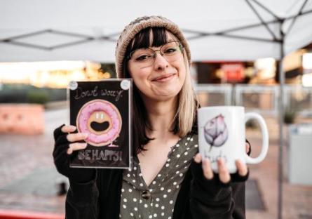 Jeni Himmer posing with her Radnaut products.