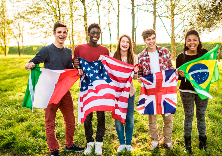 students holding flags from different countries