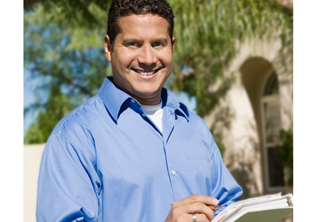 smiling realtor with documents