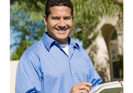 smiling realtor with documents