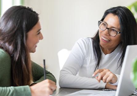 Two women discussing about career services