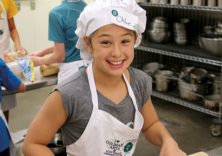 A photo of kids learning about cooking at SCC's culinary program.