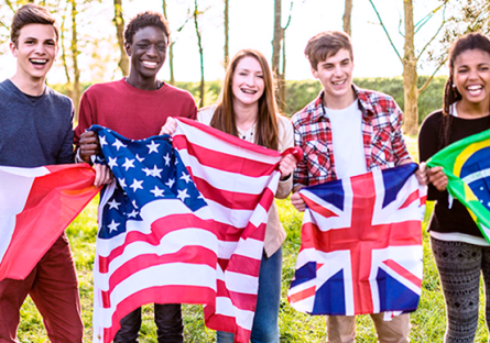 students holding flags from different countries