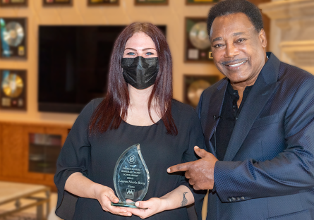 George Benson with scholarship awardee Lauren Berry