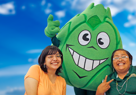 artichoke mascot and two students