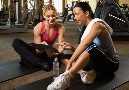 trainer consulting with other trainer