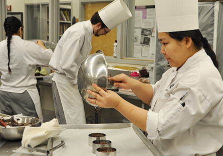 scc culinary arts students preparing food in kitchen