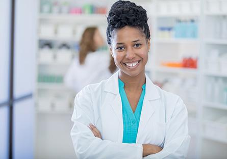 pharmacy technician smiling while working