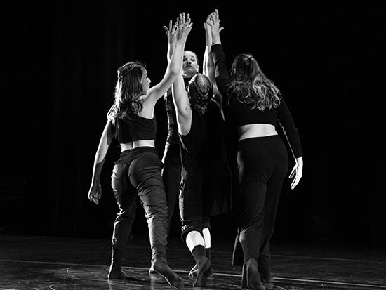 dance group performing on stage