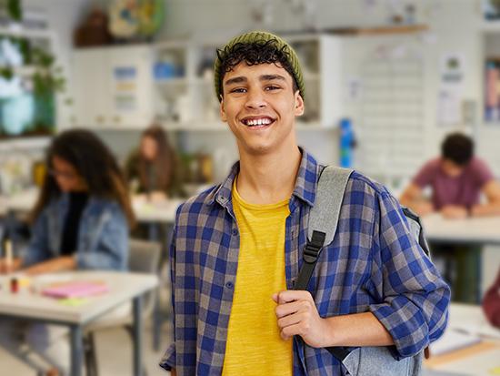 smiling student in classroom