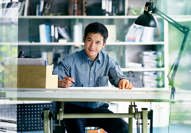student working at drafting table