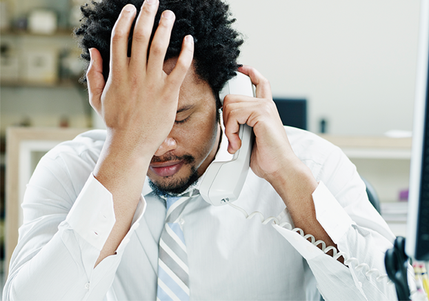 stressed employee on the phone