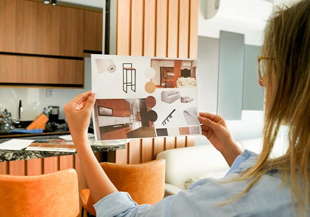 designer reviewing design board