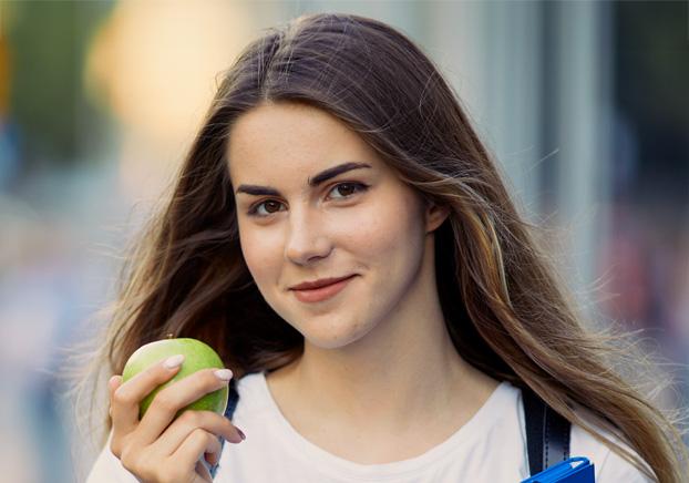 person eating an apple
