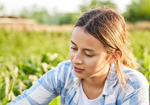 student working in nature