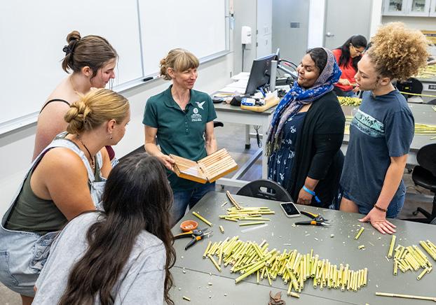 students and faculty at a service-learning event