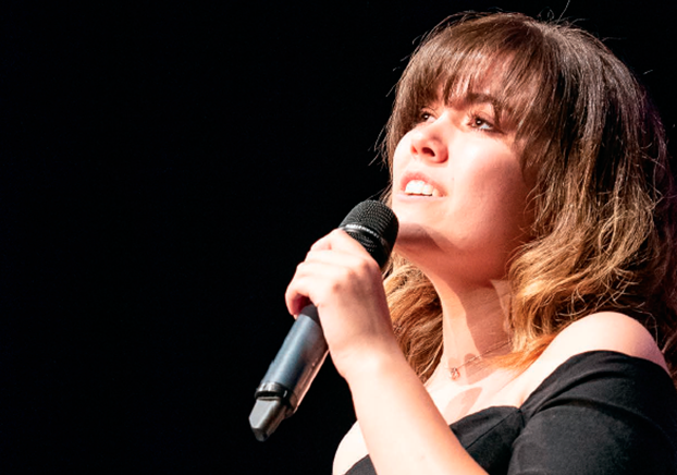 student singing