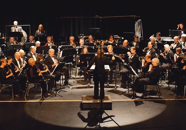 concert band on stage with conductor